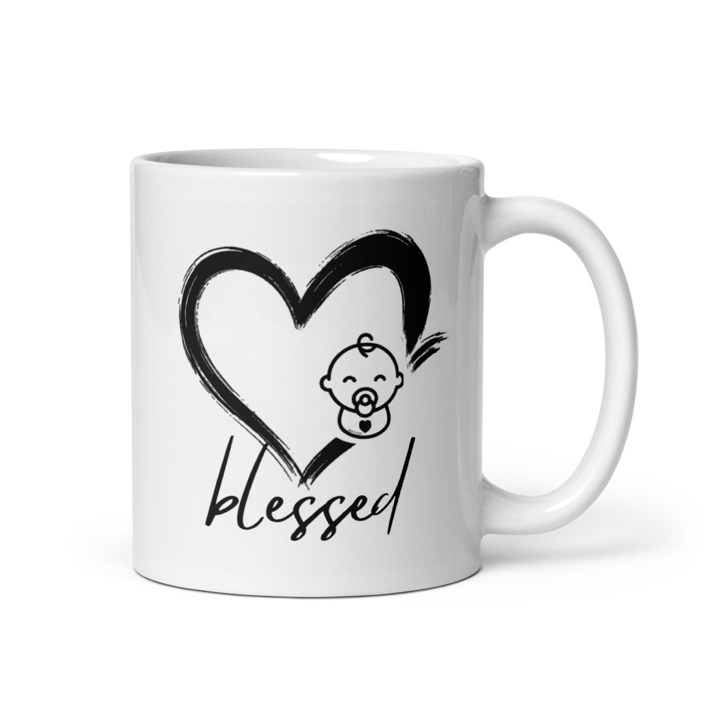 White mug with the Blessed Baby heart-and-pacifier design in a clean front-facing product photo